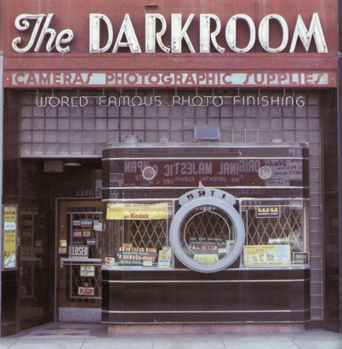 vintage-darkroom-camera-shop-store-front-lens-window-550x561