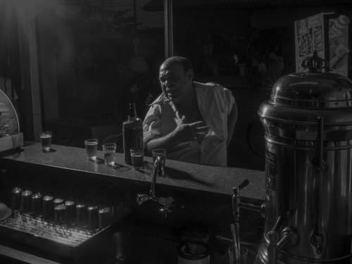 Brazil 2014. Santos. Drunk man at bar.